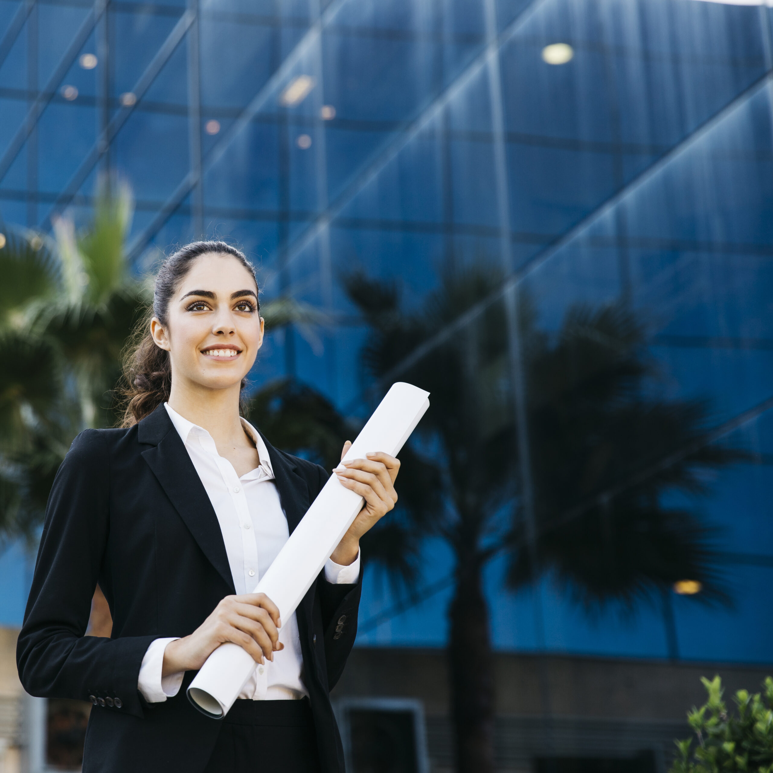 professional businesswoman holding plan